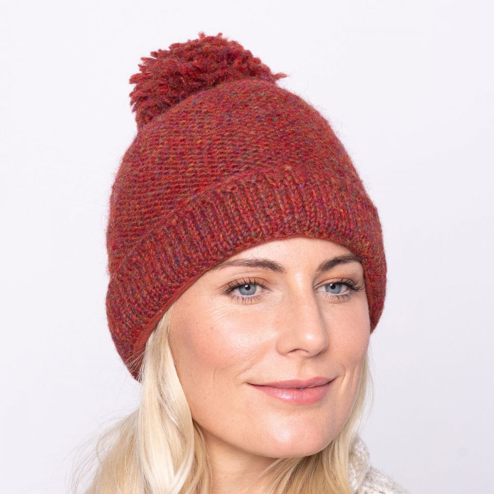 rust bobble hat