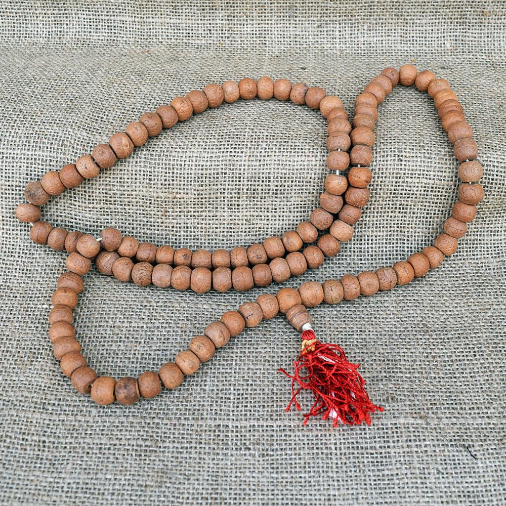 Mala beads - light coloured bodhi beads - with guru bead and
