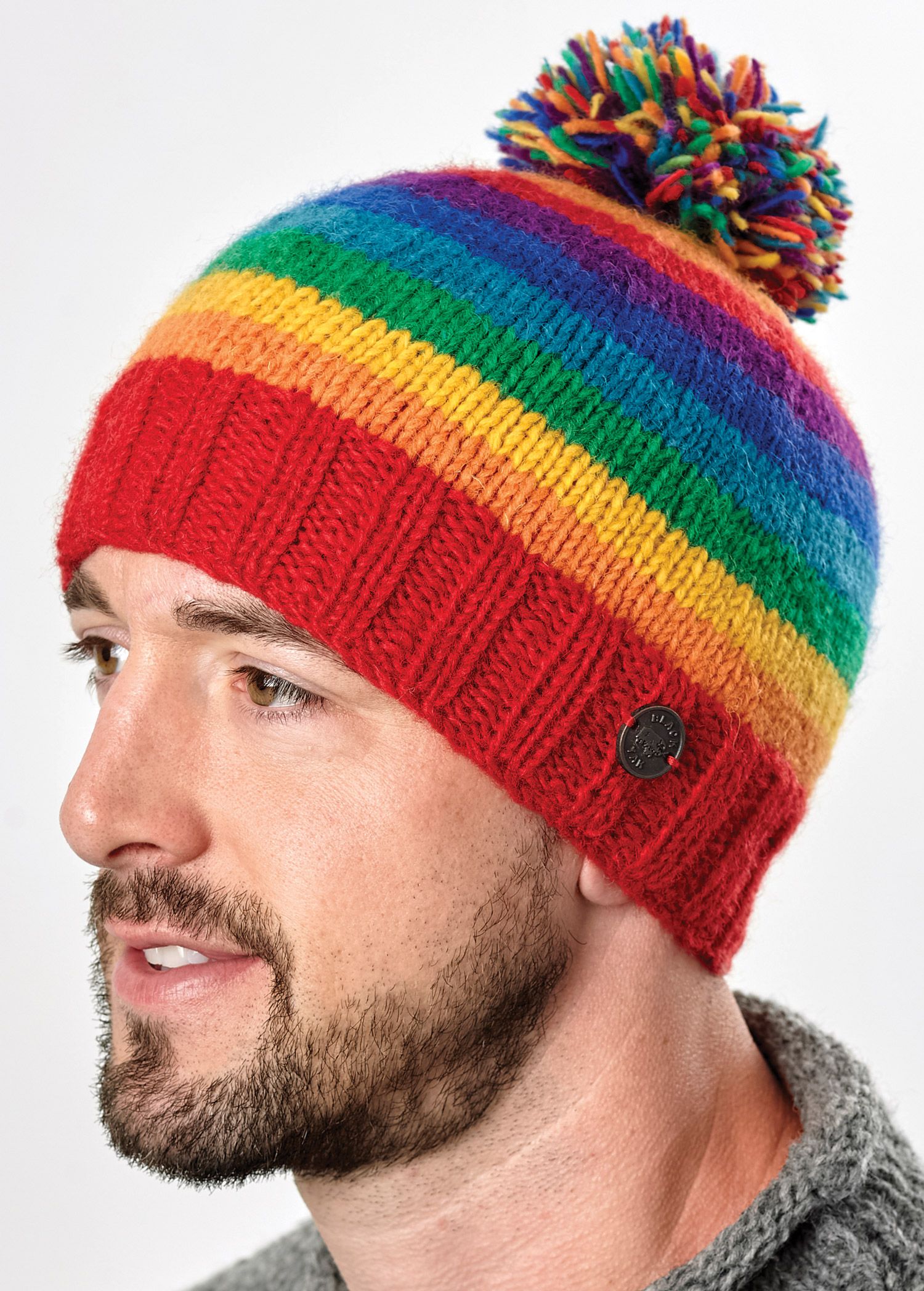 Bobble hat - pure wool - hand knitted - fleece lining - rainbow | Black Yak
